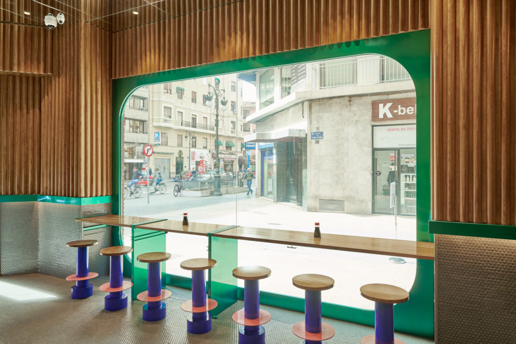 purple stools and timber cladding